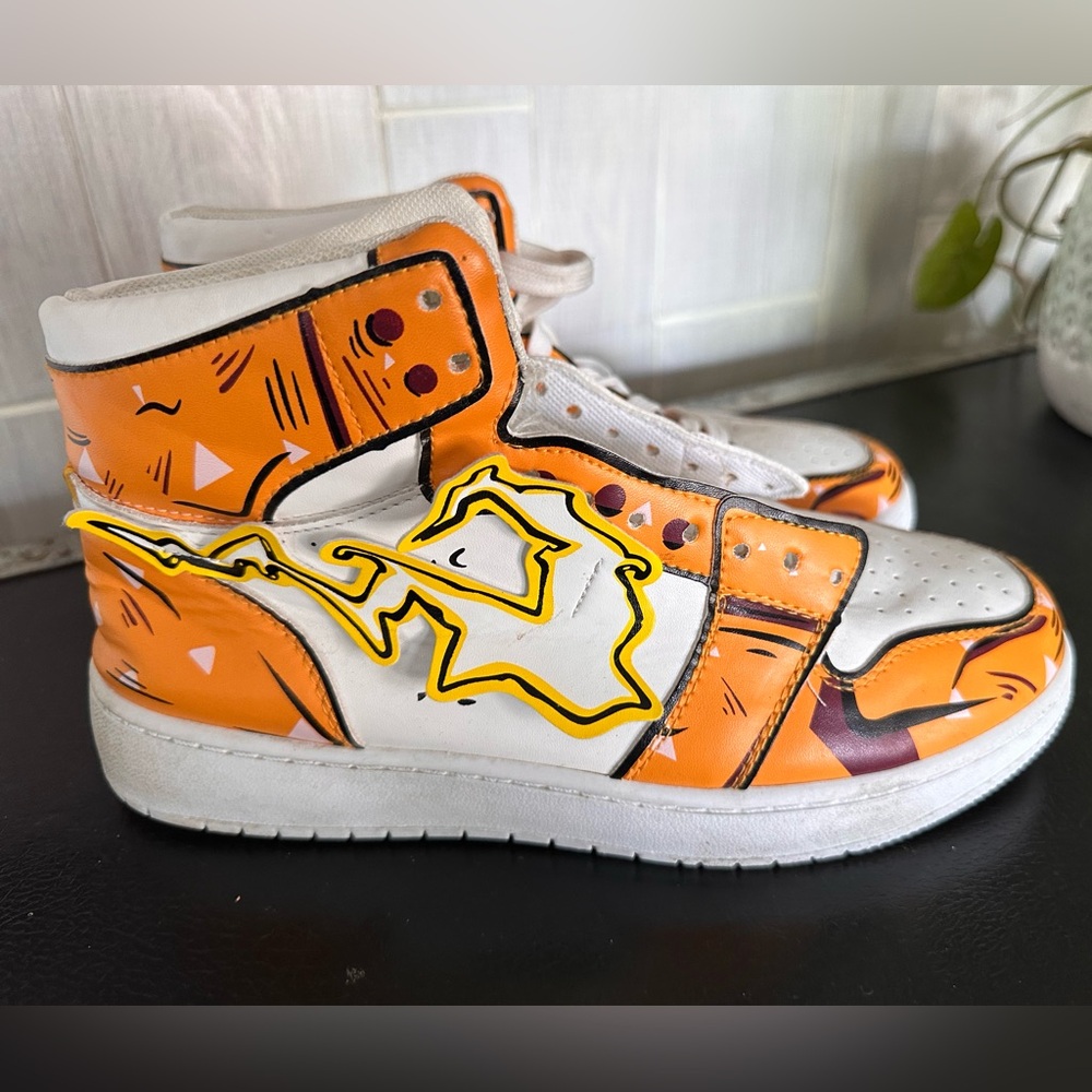 Playful Orange and White Cartoon Sneakers